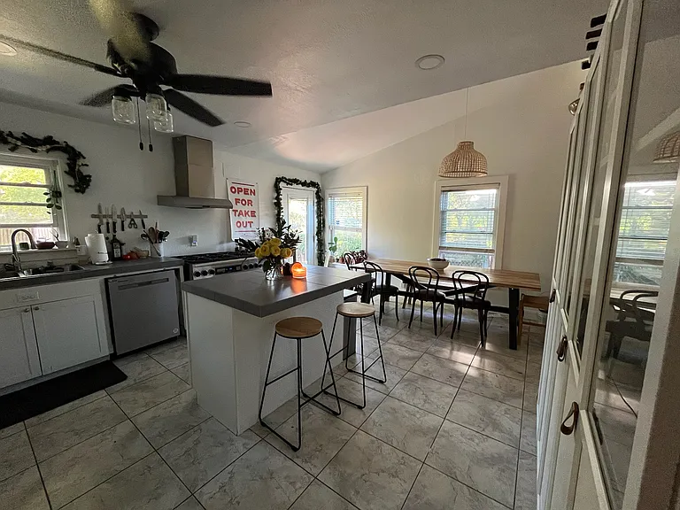 Large eat-in kitchen with gas stove, dishwasher, refridgerator, and microwave