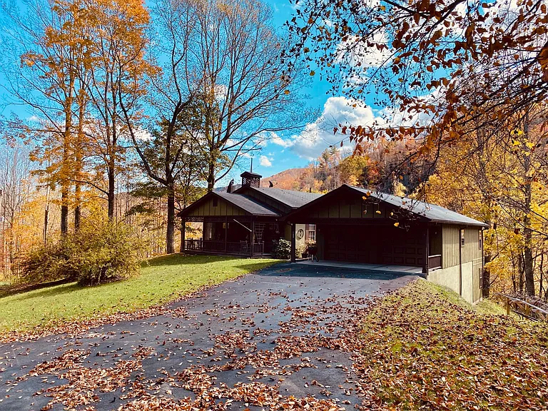 Guest house is attached to back of detached garage building to the right. The Chapel to the left is rented separately.