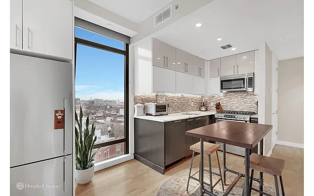 Sold by Douglas Elliman | media 9