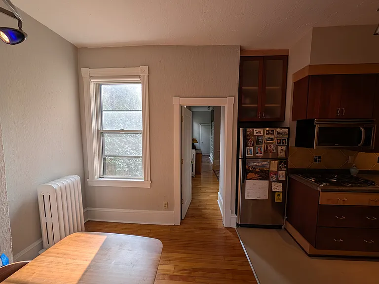 bedroom entry from kitchen/dining area