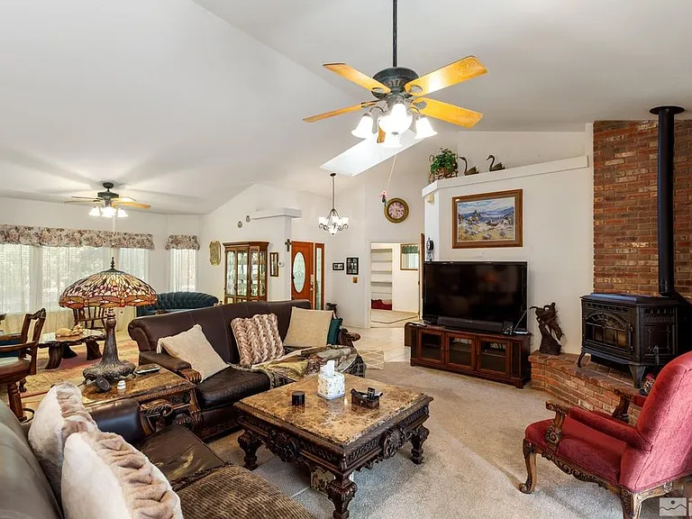 Family room/common area. Watch TV, enjoy the fireplace in winter.