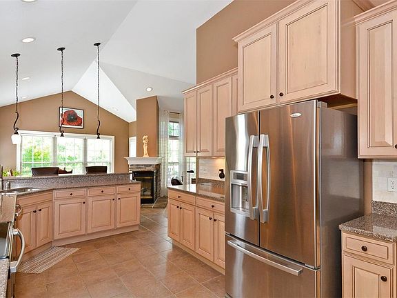 Custom Cabinetry, Quartz Counter tops, Porcelain Tile Back Splash, Stainless Appliances