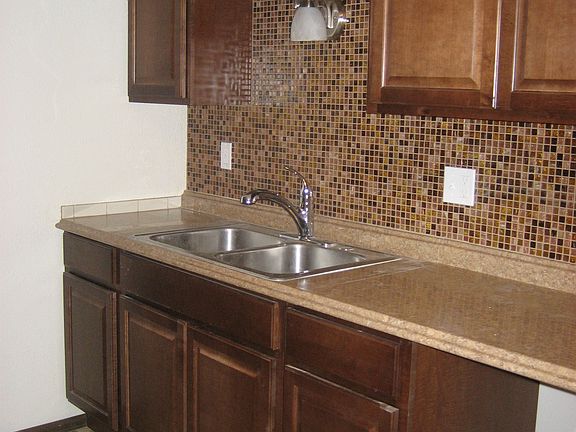 Kitchen includes all appliances except for a range.