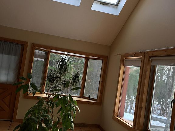 sunroom, skylight, bay window and door