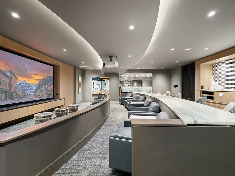 Media room with HD projector and cinema-style seating