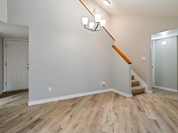 Dining Area next to Staircase that leads to the Loft and Master Bedroom