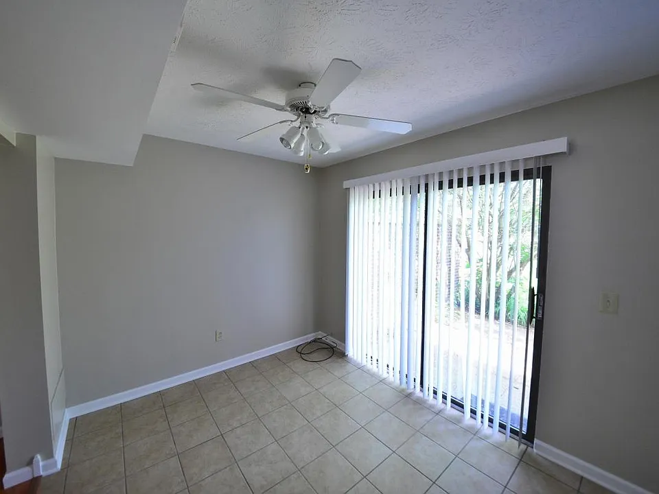 Dining area in the kitchen with sliding doors to the patio