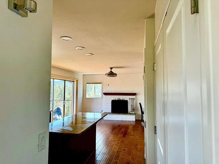 View entering the kitchen and family room area. Tons of storage throughout.