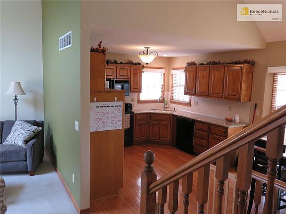 Main level Formal Living Rm, Kitchen & Dining area.
