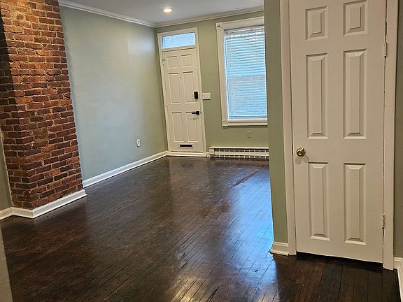 Living room with coat closet