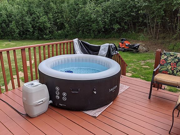 rear deck with hot tub