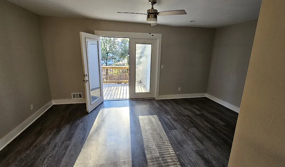 Double door entry off living room to deck