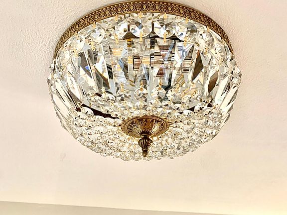 Detail photo of light fixtures (2) in entry hall.