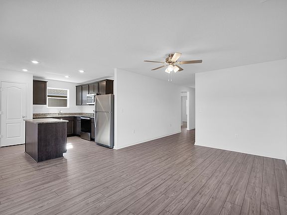 The open-concept kitchen overlooking the entertainment space is a fan favorite