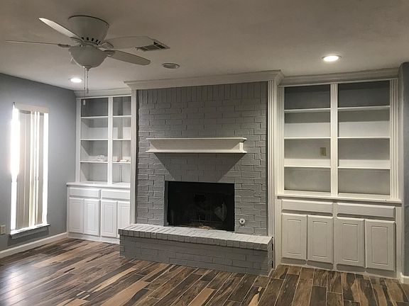 Fireplace with bookcase