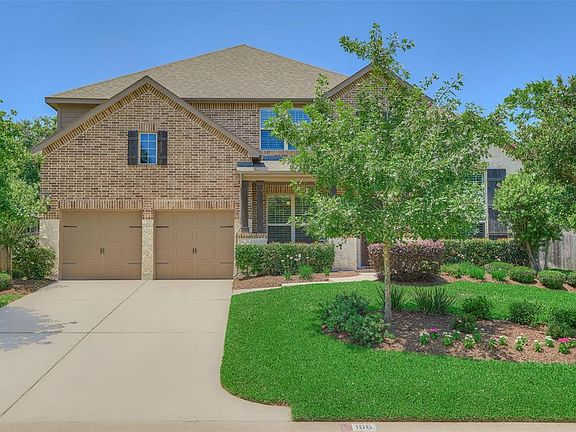 Nicely Landscaped with Two Car Tandem Garage