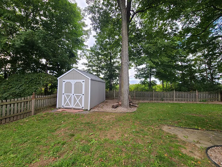 Shed included for additional storage