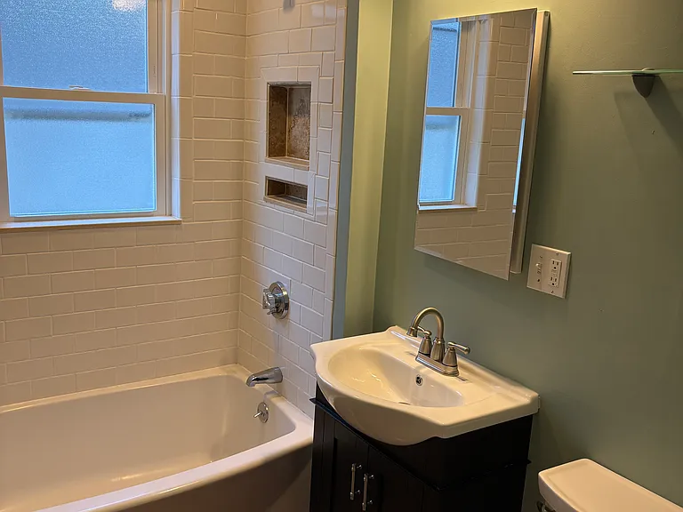 Remodeled bathroom with tub