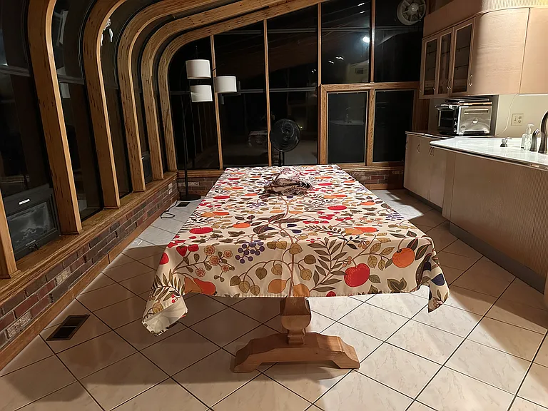 Sunroom with large kitchen table available for renter.