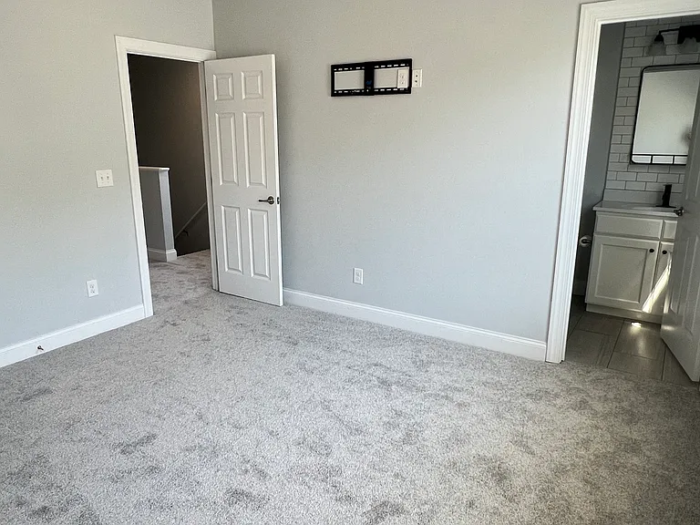Upstairs secondary room with full bath.