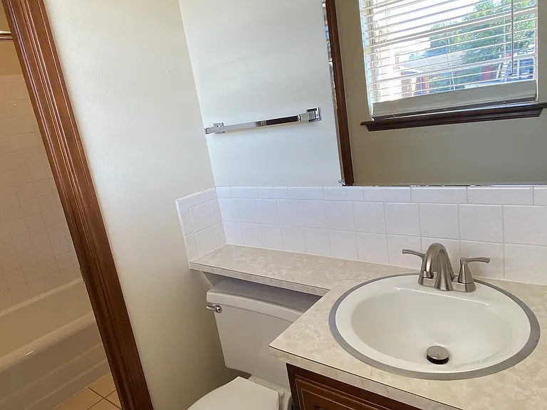 5709 NW Briarwood Dr — Photo 17