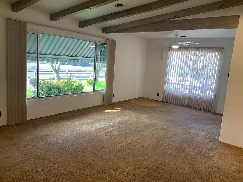 Large open living/dining room overlooking Main Street.