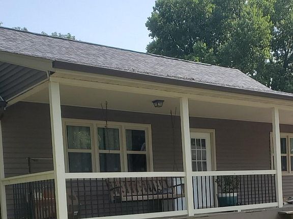 LARGE PORCH FACES BIKE TRAIL