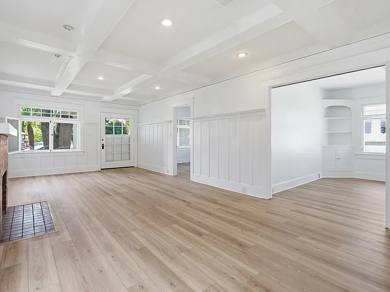 Living room with wood burning fireplace
