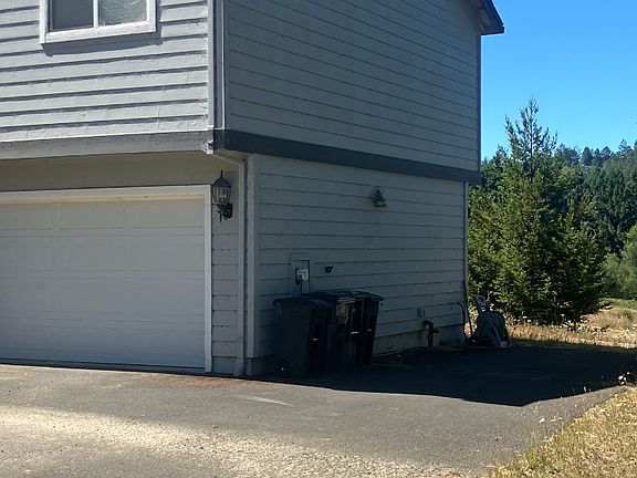 Side of house. RV area.