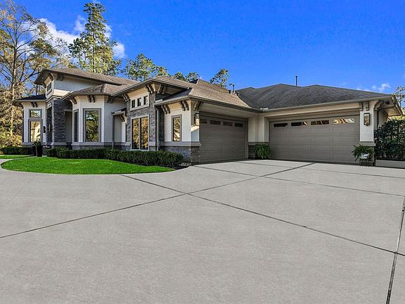 Generous 4 car garage with epoxy floors. Easily accommodates all your recreational toys.