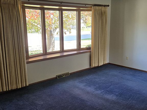 Living room looking at the front bay windows