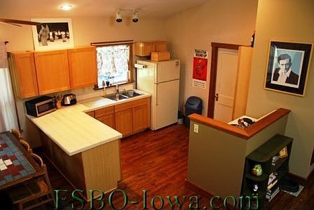 Enjoy cooking in the open kitchen!  Plenty of light and counter space. Dishwasher, stove and fridge stay.
