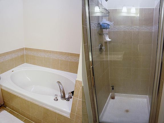 Master bathroom with tub and shower (and two sinks)