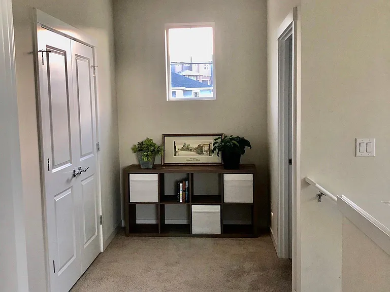 linen closet at top of stairs