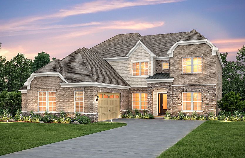 Harrington Exterior 8 features stone, brick, shakes, covered front door and 2 car courtyard garage