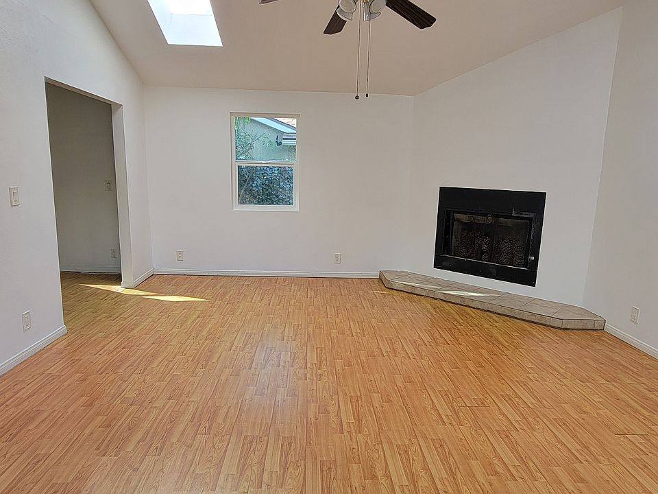 Family Room with fireplace and door to back yard