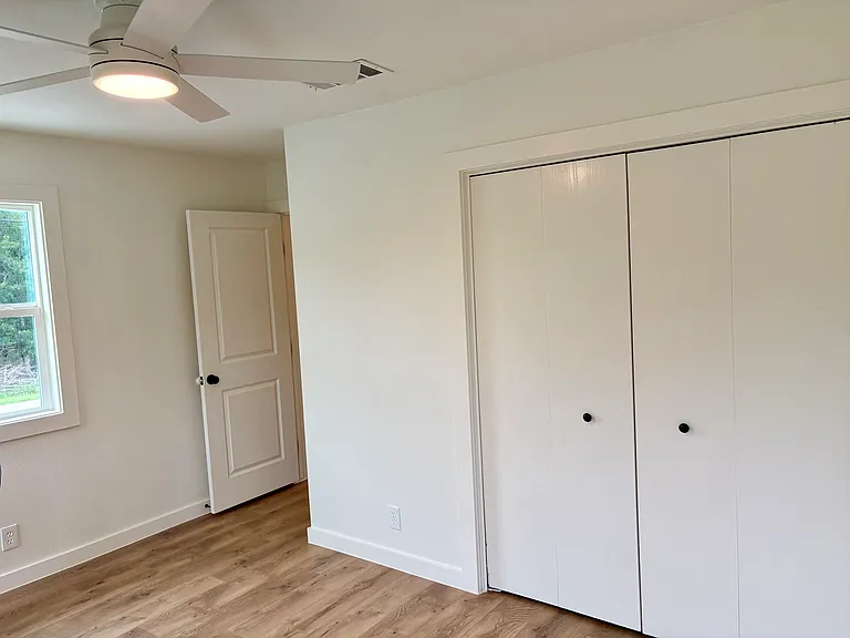 Bedroom 2 with 3 large windows, great natural light