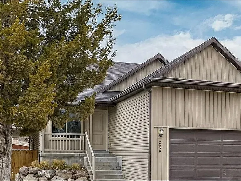 Included to show the exterior of the home. Garage not included with basement unit