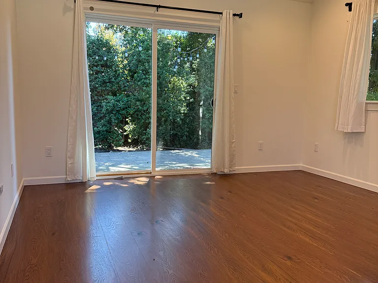 Living room access to private patio