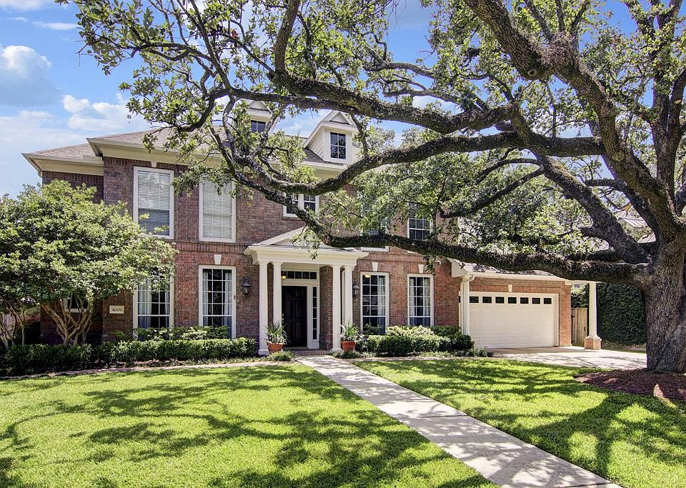 Traditional home with superior location in Oak Estates neighborhood.