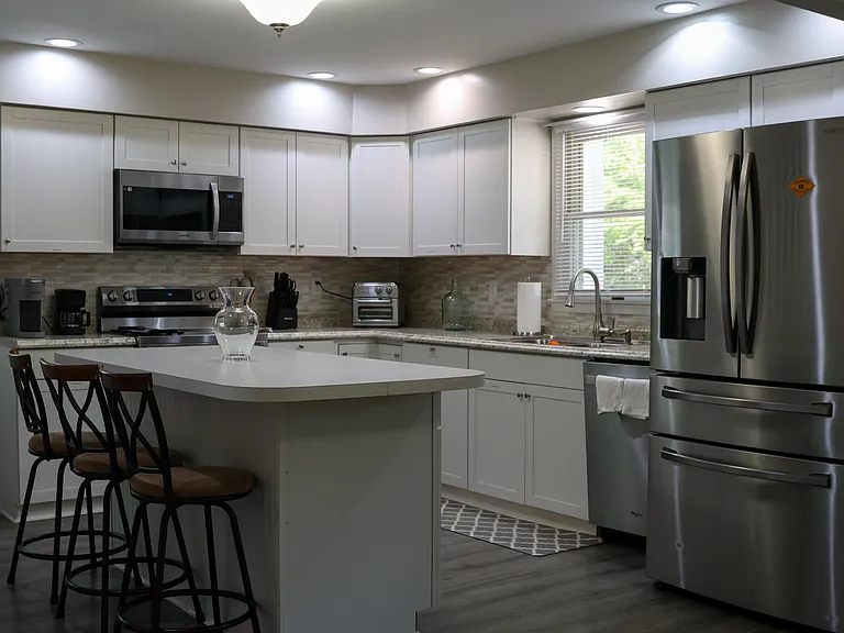 Kitchen with stainless steel appliances.