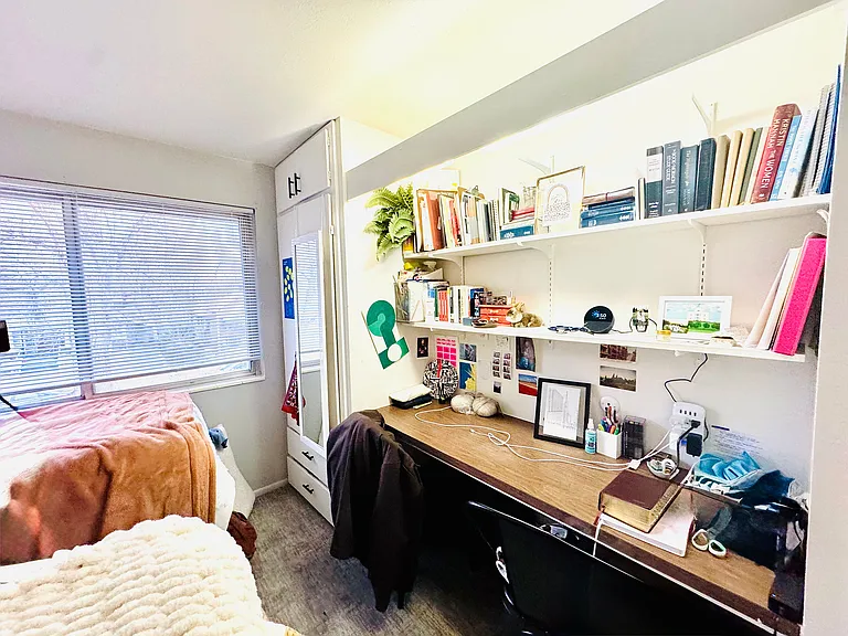 Embrace productivity in this charming study nook, perfect for reading and relaxation.