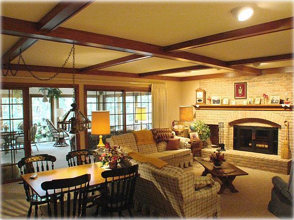 Family Rm beamed ceiling + Fireplace