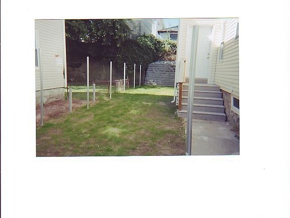 new fence and retaining wall