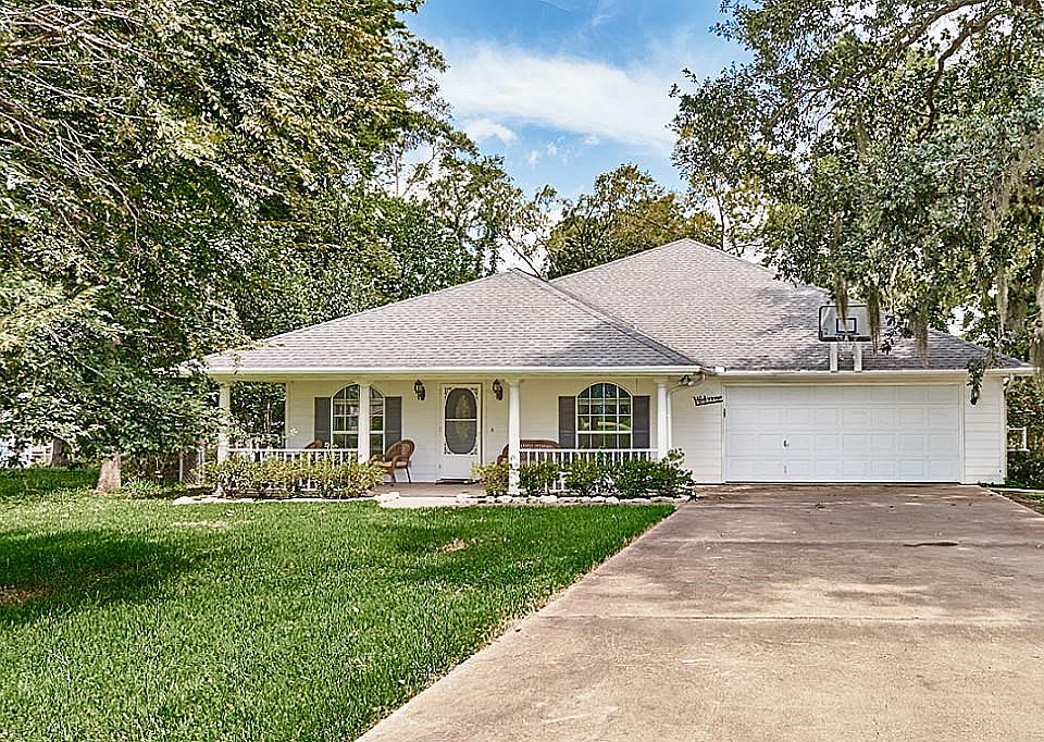 Located in The Landing, This Stunning Custom home is updated with fresh transitional style