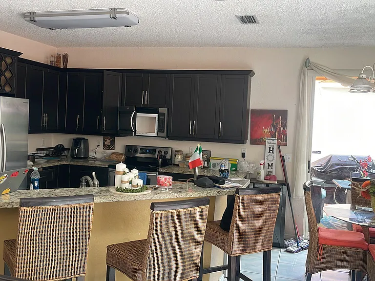 617 NW 155th Ter — Photo 3