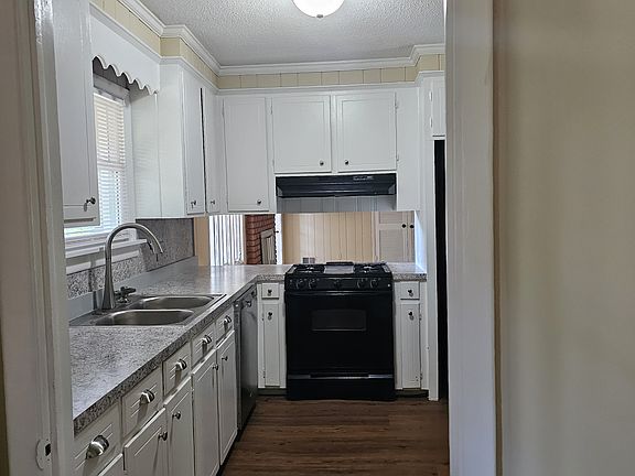 Kitchen, laundry and office have new plank flooring