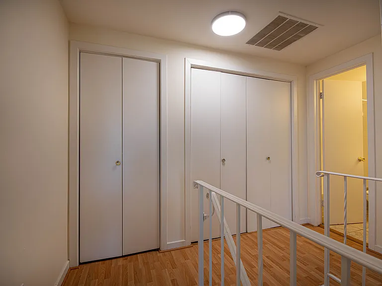 Upstairs Hallway w/Linen Closet and Washer/Dryer