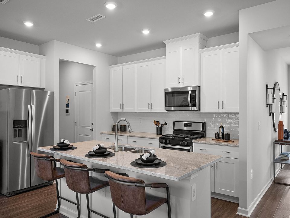 Kitchen in the Brentwood floorplan at a Meritage Homes community in Graham, NC.
