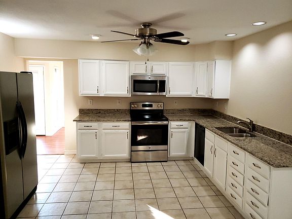 Spacious Kitchen with Granite countertops and Stainless Steel appliances